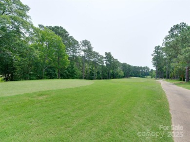 Yes, you can have it all! This recently renovated primary on the on Highland Creek Golf Club in North Carolina - for sale on GolfHomes.com, golf home, golf lot