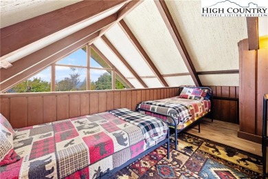 Discover a beautifully renovated and fully furnished 3-bedroom on Beech Mountain Club in North Carolina - for sale on GolfHomes.com, golf home, golf lot