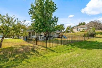 FINALLY! A charming home, well maintained, move-in ready, on the on Pecan Plantation Country Club in Texas - for sale on GolfHomes.com, golf home, golf lot