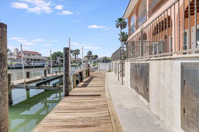 Port Aransas Paradise!  Beautiful canal front shady side home on Palmilla Beach Golf Club in Texas - for sale on GolfHomes.com, golf home, golf lot