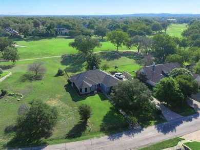MOTIVATED SELLER has outgrown this charming home and they have on Pecan Plantation Country Club in Texas - for sale on GolfHomes.com, golf home, golf lot