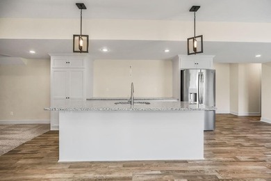 Beautiful 2-story home on Tee Box 12 of the Shawnee Country Club on Shawnee Golf and Country Club in Kansas - for sale on GolfHomes.com, golf home, golf lot