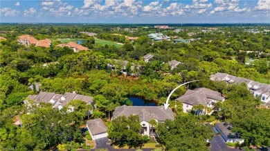 Tucked away in the coveted Oakwood Carriage Homes of Bonita Bay on Bonita Bay West in Florida - for sale on GolfHomes.com, golf home, golf lot