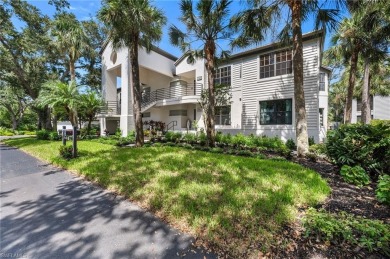 Tucked away in the coveted Oakwood Carriage Homes of Bonita Bay on Bonita Bay West in Florida - for sale on GolfHomes.com, golf home, golf lot