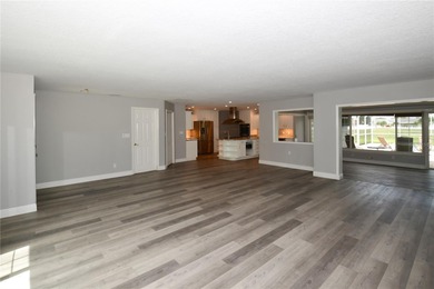 Tucked in a peaceful and highly sought-after Deed Restricted on Seminole Lake Country Club in Florida - for sale on GolfHomes.com, golf home, golf lot