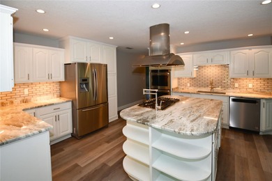 Tucked in a peaceful and highly sought-after Deed Restricted on Seminole Lake Country Club in Florida - for sale on GolfHomes.com, golf home, golf lot