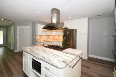 Tucked in a peaceful and highly sought-after Deed Restricted on Seminole Lake Country Club in Florida - for sale on GolfHomes.com, golf home, golf lot