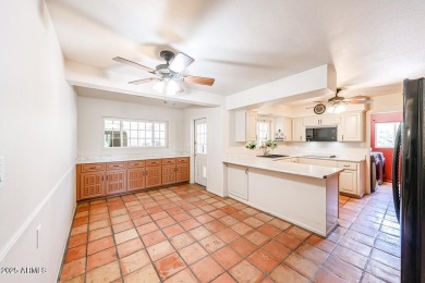 Desirable ranch-style home situated on an oversized lot on Wigwam Golf and Country Club in Arizona - for sale on GolfHomes.com, golf home, golf lot