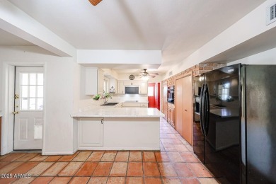 Desirable ranch-style home situated on an oversized lot on Wigwam Golf and Country Club in Arizona - for sale on GolfHomes.com, golf home, golf lot