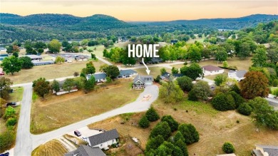 Discover this beautifully updated 3 bedroom, 3 bathroom home on on Holiday Island Executive Golf Course in Arkansas - for sale on GolfHomes.com, golf home, golf lot