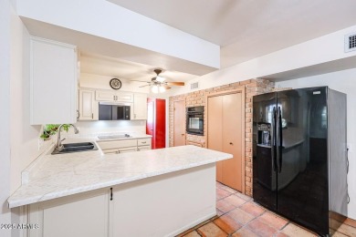 Desirable ranch-style home situated on an oversized lot on Wigwam Golf and Country Club in Arizona - for sale on GolfHomes.com, golf home, golf lot