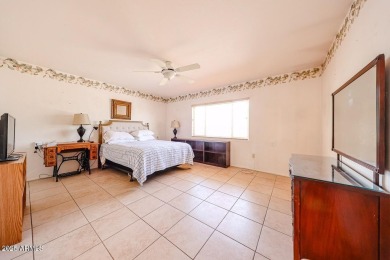 Desirable ranch-style home situated on an oversized lot on Wigwam Golf and Country Club in Arizona - for sale on GolfHomes.com, golf home, golf lot