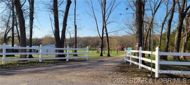 20 acre CAMPGROUND down the street from TRUMAN DAM, SWIM BEACH & on Shawnee Bend Golf Course in Missouri - for sale on GolfHomes.com, golf home, golf lot