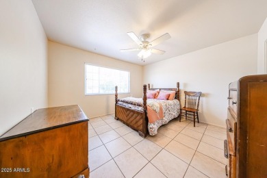 Desirable ranch-style home situated on an oversized lot on Wigwam Golf and Country Club in Arizona - for sale on GolfHomes.com, golf home, golf lot