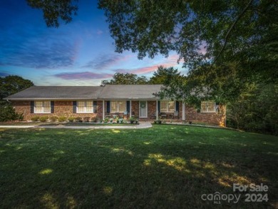 Located on Hole 15 of Riverbend Golf Course, this beautiful home on River Bend YMCA Golf Course in North Carolina - for sale on GolfHomes.com, golf home, golf lot