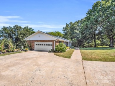 Located on Hole 15 of Riverbend Golf Course, this beautiful home on River Bend YMCA Golf Course in North Carolina - for sale on GolfHomes.com, golf home, golf lot