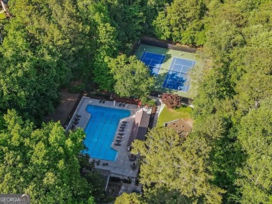 This stunning, spacious, all brick updated home in an amazing on Dunwoody Country Club in Georgia - for sale on GolfHomes.com, golf home, golf lot