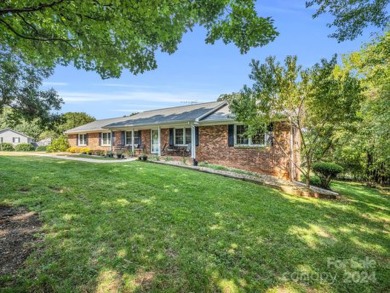 Located on Hole 15 of Riverbend Golf Course, this beautiful home on River Bend YMCA Golf Course in North Carolina - for sale on GolfHomes.com, golf home, golf lot