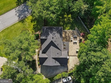 This stunning, spacious, all brick updated home in an amazing on Dunwoody Country Club in Georgia - for sale on GolfHomes.com, golf home, golf lot