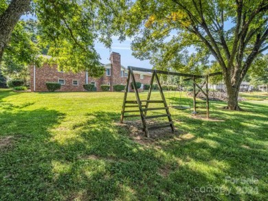 Located on Hole 15 of Riverbend Golf Course, this beautiful home on River Bend YMCA Golf Course in North Carolina - for sale on GolfHomes.com, golf home, golf lot