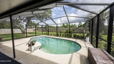 This amazing home has a VA assumable mortgage with a 2.875 % on Bay Point Resort Golf Club in Florida - for sale on GolfHomes.com, golf home, golf lot