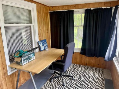 Cottage style home on Residential / Commercial lot. Located next on Charlevoix Golf Club in Michigan - for sale on GolfHomes.com, golf home, golf lot