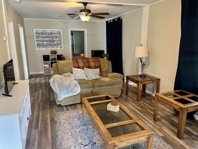 Cottage style home on Residential / Commercial lot. Located next on Charlevoix Golf Club in Michigan - for sale on GolfHomes.com, golf home, golf lot