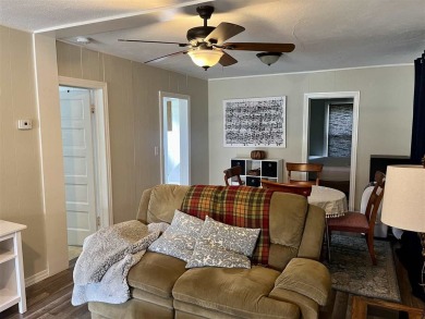 Cottage style home on Residential / Commercial lot. Located next on Charlevoix Golf Club in Michigan - for sale on GolfHomes.com, golf home, golf lot