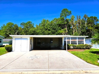 This home is located on leased land in a 55+ resort-style MH on Big Cypress Golf and Country Club in Florida - for sale on GolfHomes.com, golf home, golf lot