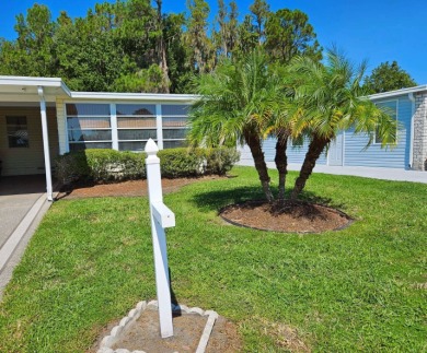 This home is located on leased land in a 55+ resort-style MH on Big Cypress Golf and Country Club in Florida - for sale on GolfHomes.com, golf home, golf lot