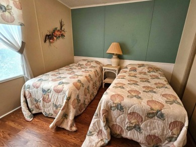 This home is located on leased land in a 55+ resort-style MH on Big Cypress Golf and Country Club in Florida - for sale on GolfHomes.com, golf home, golf lot