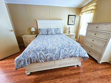This home is located on leased land in a 55+ resort-style MH on Big Cypress Golf and Country Club in Florida - for sale on GolfHomes.com, golf home, golf lot