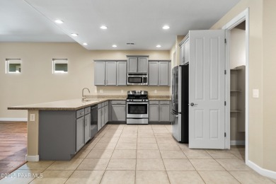 Welcome to this spacious two-story home showcasing the desirable on Prescott Lakes Golf and Country Club in Arizona - for sale on GolfHomes.com, golf home, golf lot