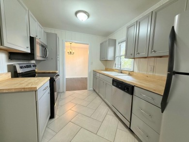 Discover this beautifully updated 3-bedroom, 1-bath Bedford on Arlington Association in Kentucky - for sale on GolfHomes.com, golf home, golf lot