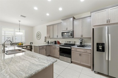 Experience effortless Florida living in this modern and on Lake Ashton Golf Club in Florida - for sale on GolfHomes.com, golf home, golf lot