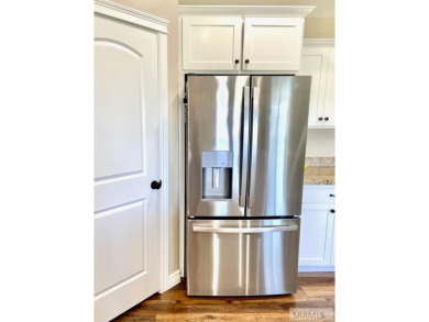 Charming duplex in a desirable neighborhood, on a quiet street on Blackfoot Municipal Golf Course in Idaho - for sale on GolfHomes.com, golf home, golf lot