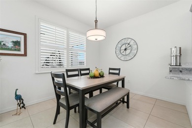 Experience effortless Florida living in this modern and on Lake Ashton Golf Club in Florida - for sale on GolfHomes.com, golf home, golf lot