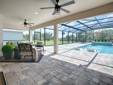 STUNNING 3/2 EXPANDED IRIS DESIGNER with SALT WATER HEATED POOL on Pennbrooke Fairways in Florida - for sale on GolfHomes.com, golf home, golf lot