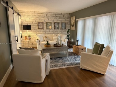Stunning Remodeled Townhouse in the Heart of Doral! Located on  in Florida - for sale on GolfHomes.com, golf home, golf lot
