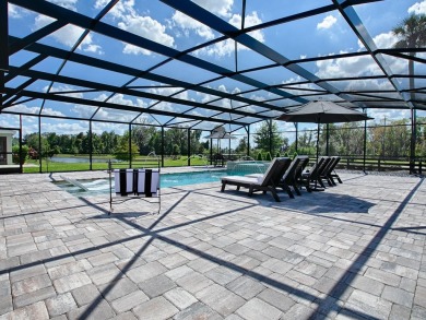 STUNNING 3/2 EXPANDED IRIS DESIGNER with SALT WATER HEATED POOL on Pennbrooke Fairways in Florida - for sale on GolfHomes.com, golf home, golf lot