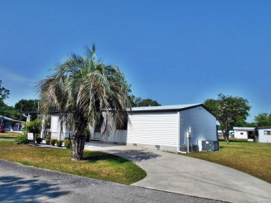 Rolling Greens Village is a friendly resort-style 55+ community on Rolling Greens Executive Golf Community in Florida - for sale on GolfHomes.com, golf home, golf lot