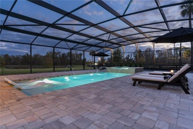 STUNNING 3/2 EXPANDED IRIS DESIGNER with SALT WATER HEATED POOL on Pennbrooke Fairways in Florida - for sale on GolfHomes.com, golf home, golf lot