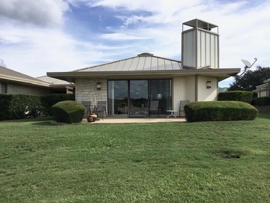 ESCAPE WEST is one of Horseshoe Bays most popular townhome on Apple Rock Golf Course - Horseshoe Bay in Texas - for sale on GolfHomes.com, golf home, golf lot