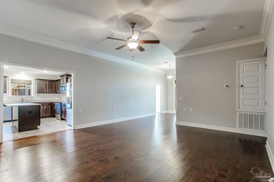 Better-than-new and truly move-in ready! This beautifully on Champion Golf Club in Florida - for sale on GolfHomes.com, golf home, golf lot