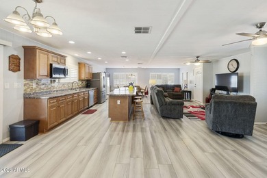 Enjoy easy living in this beautifully maintained 2BR/2BA on Fountain of the Sun Country Club in Arizona - for sale on GolfHomes.com, golf home, golf lot