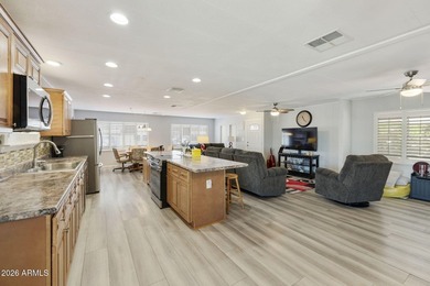 Enjoy easy living in this beautifully maintained 2BR/2BA on Fountain of the Sun Country Club in Arizona - for sale on GolfHomes.com, golf home, golf lot