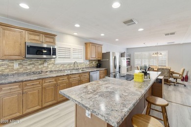 Enjoy easy living in this beautifully maintained 2BR/2BA on Fountain of the Sun Country Club in Arizona - for sale on GolfHomes.com, golf home, golf lot