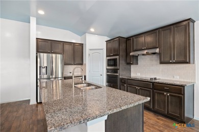 Beautiful stone-adorned home located on a huge lot in the highly on Lago Vista Golf Club in Texas - for sale on GolfHomes.com, golf home, golf lot