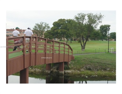 Completely furnished condo overlooking one of the pool areas is on Sunrise Lakes Phase III in Florida - for sale on GolfHomes.com, golf home, golf lot