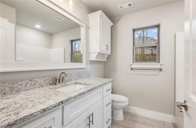 Stunning 2024-built home on a corner lot in Bentonville School on Bella Vista Country Club - Kingswood in Arkansas - for sale on GolfHomes.com, golf home, golf lot